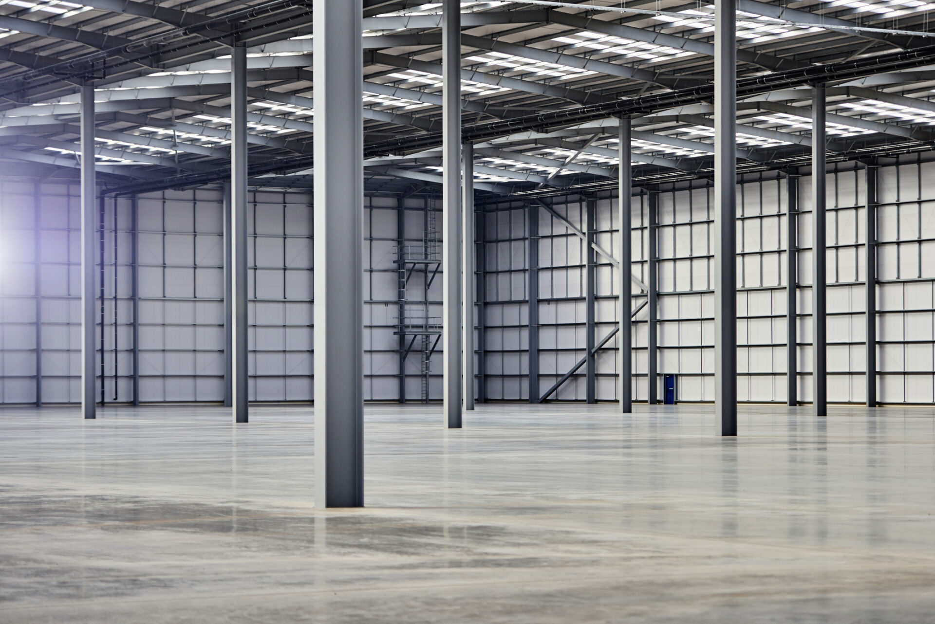Interior of empty warehouse Industrial Building Design & Construction